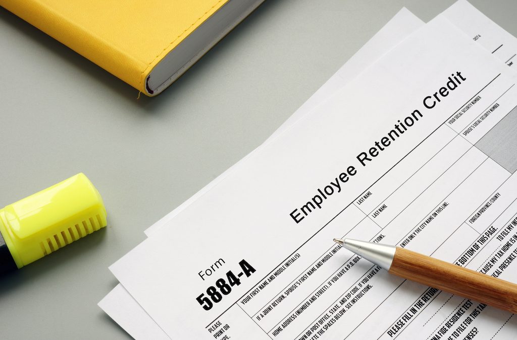 Financial concept about Form 5884-A Employee Retention Credit with inscription on the page.